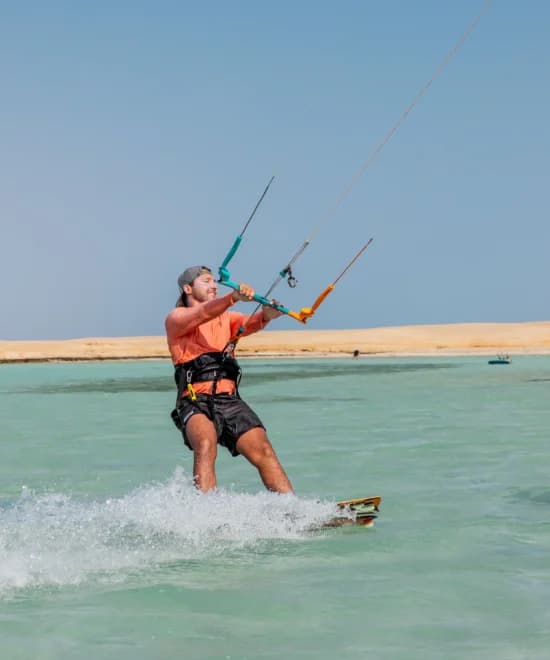 A Kite Dates ECC instructor setting up a kite for a lesson in Hurghada