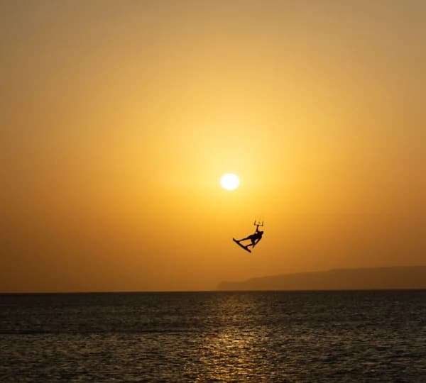 Kites of several sizes rigged and pumped on the beach before an afternoon session in Hurghada