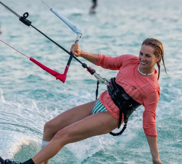 Kitesurfer riding the turquoise shallows of the Egyptian Red Sea at Hurghada