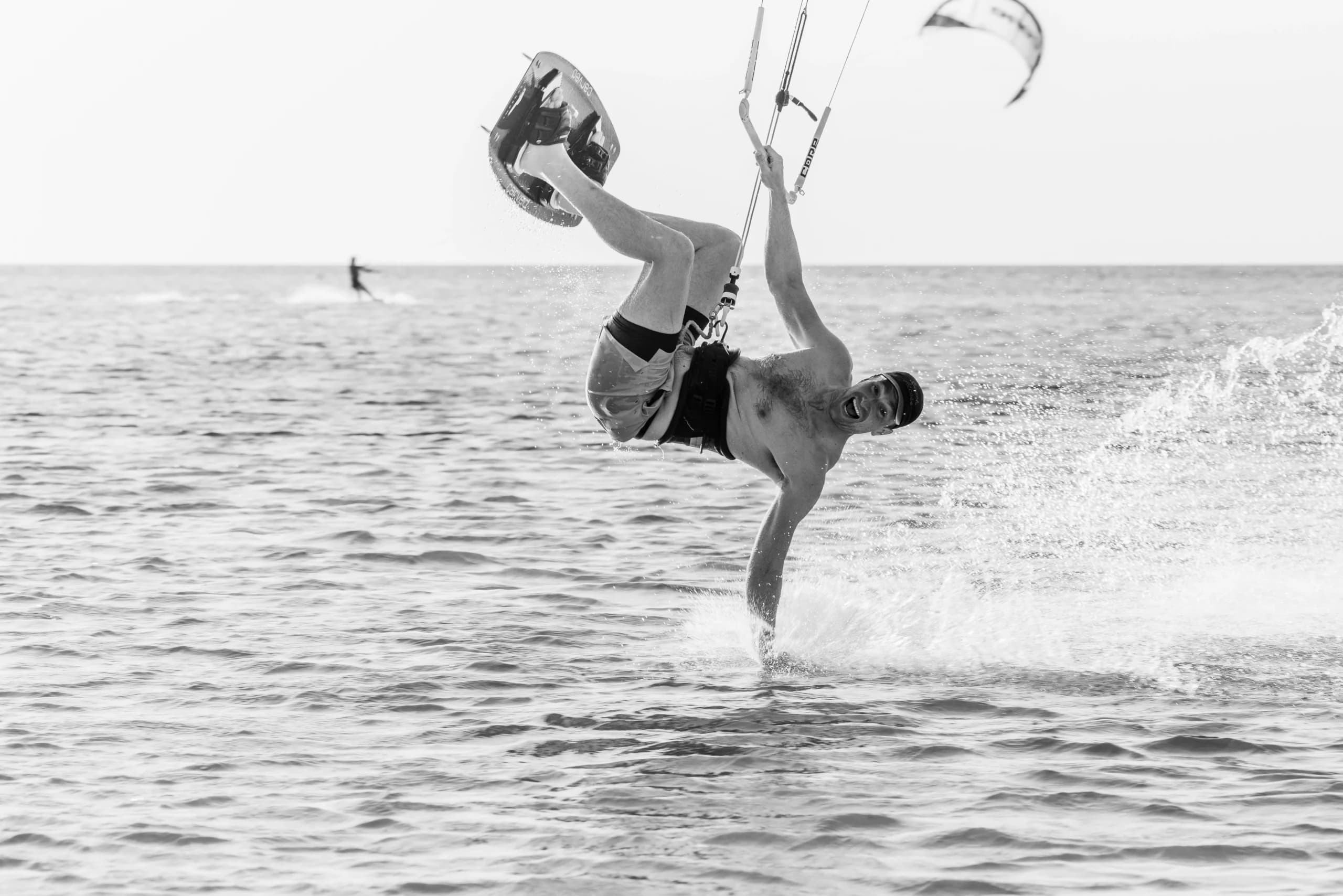 Kitesurfer riding flat turquoise water off Hurghada on the Egyptian Red Sea